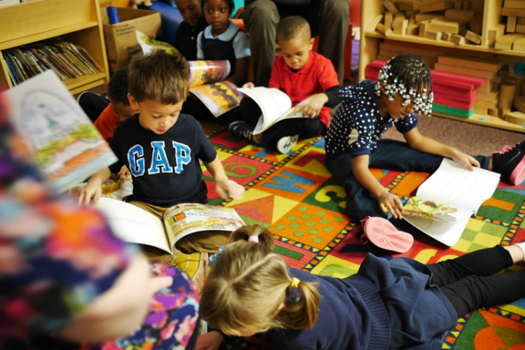 Children Reading Books in Classroom